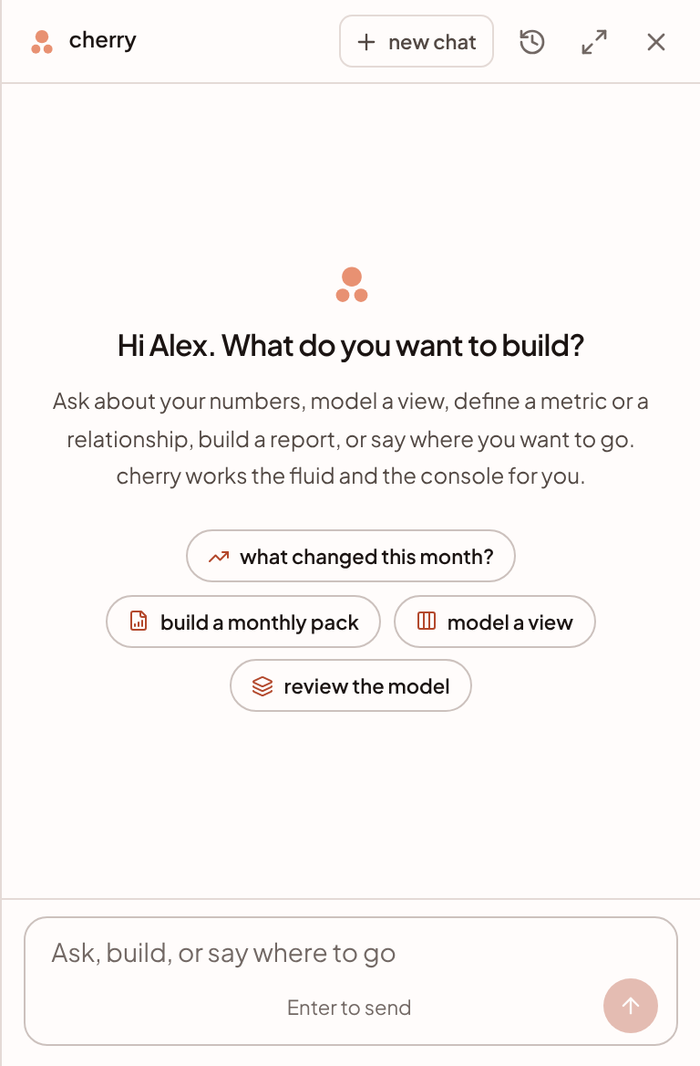 The cherry pane on a new conversation, with four suggested first questions and the box to ask in.